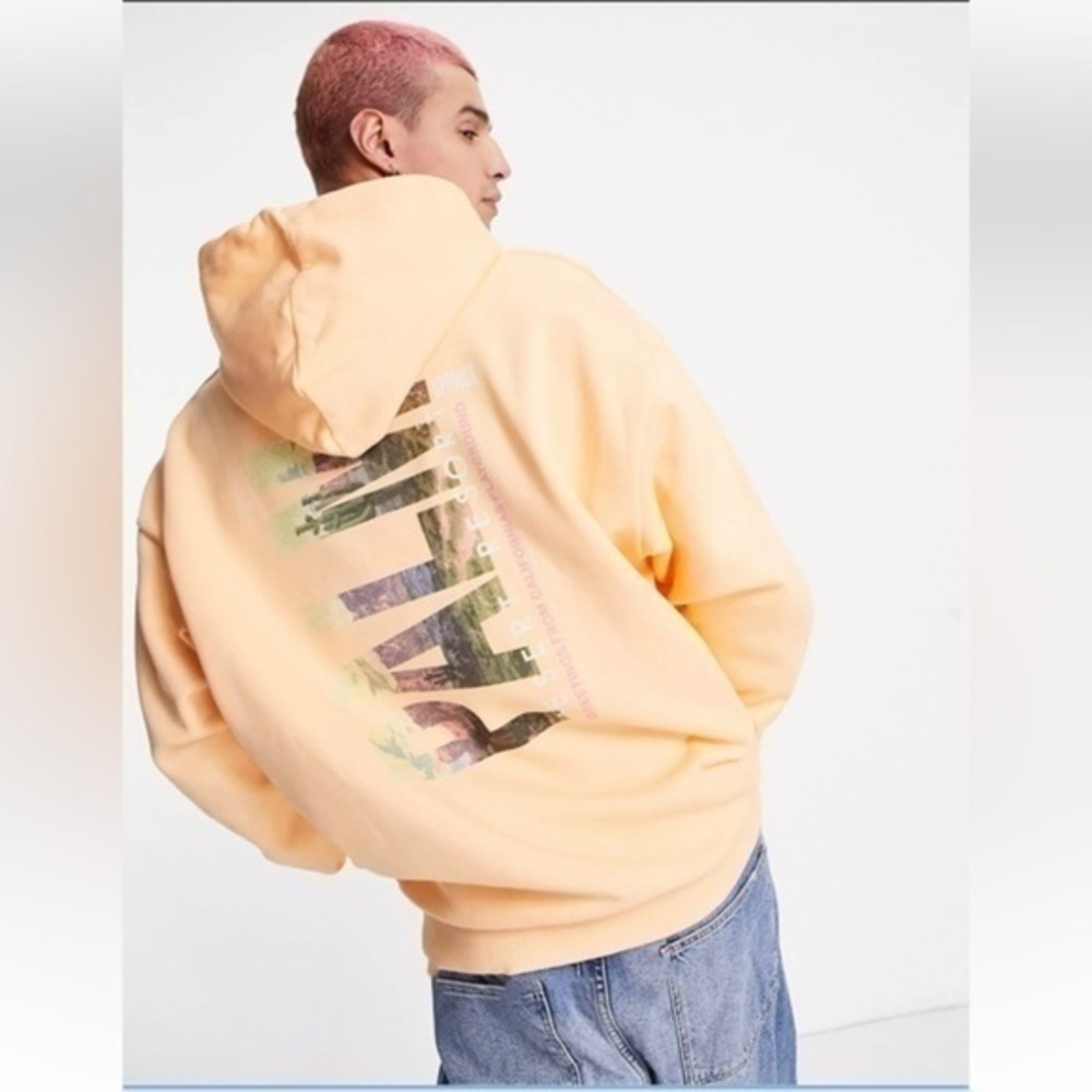 ASOS Reclaimed Vintage Inspired Palm print hoodie in orange